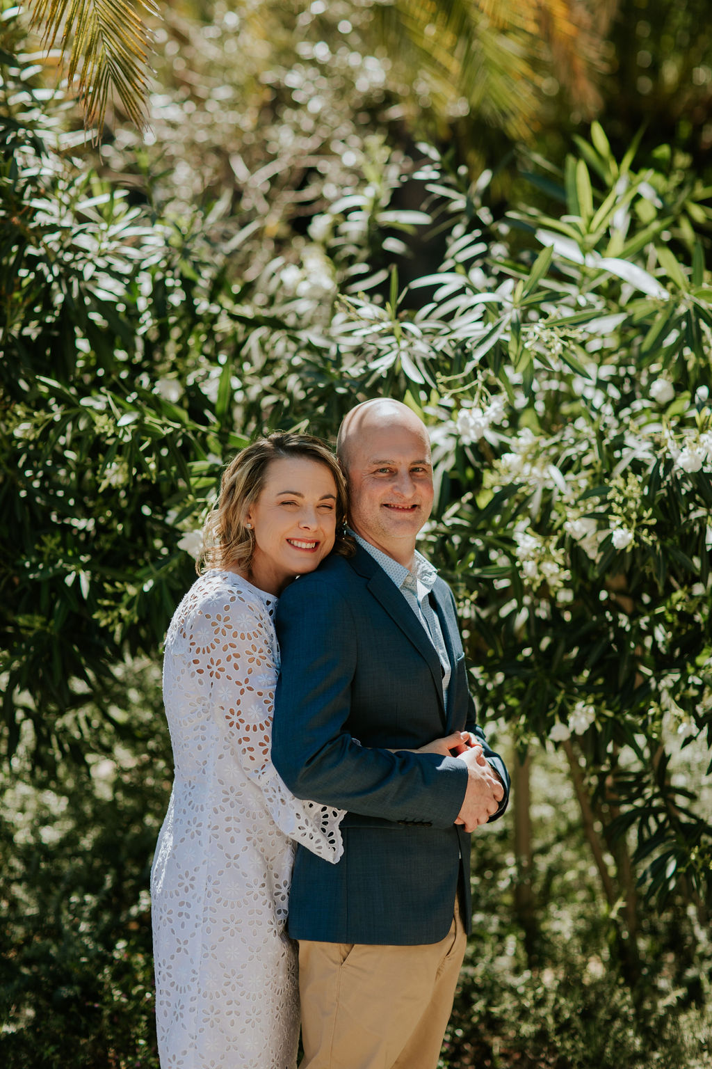 Newly married couple taking photos at Howard Smith Wharves