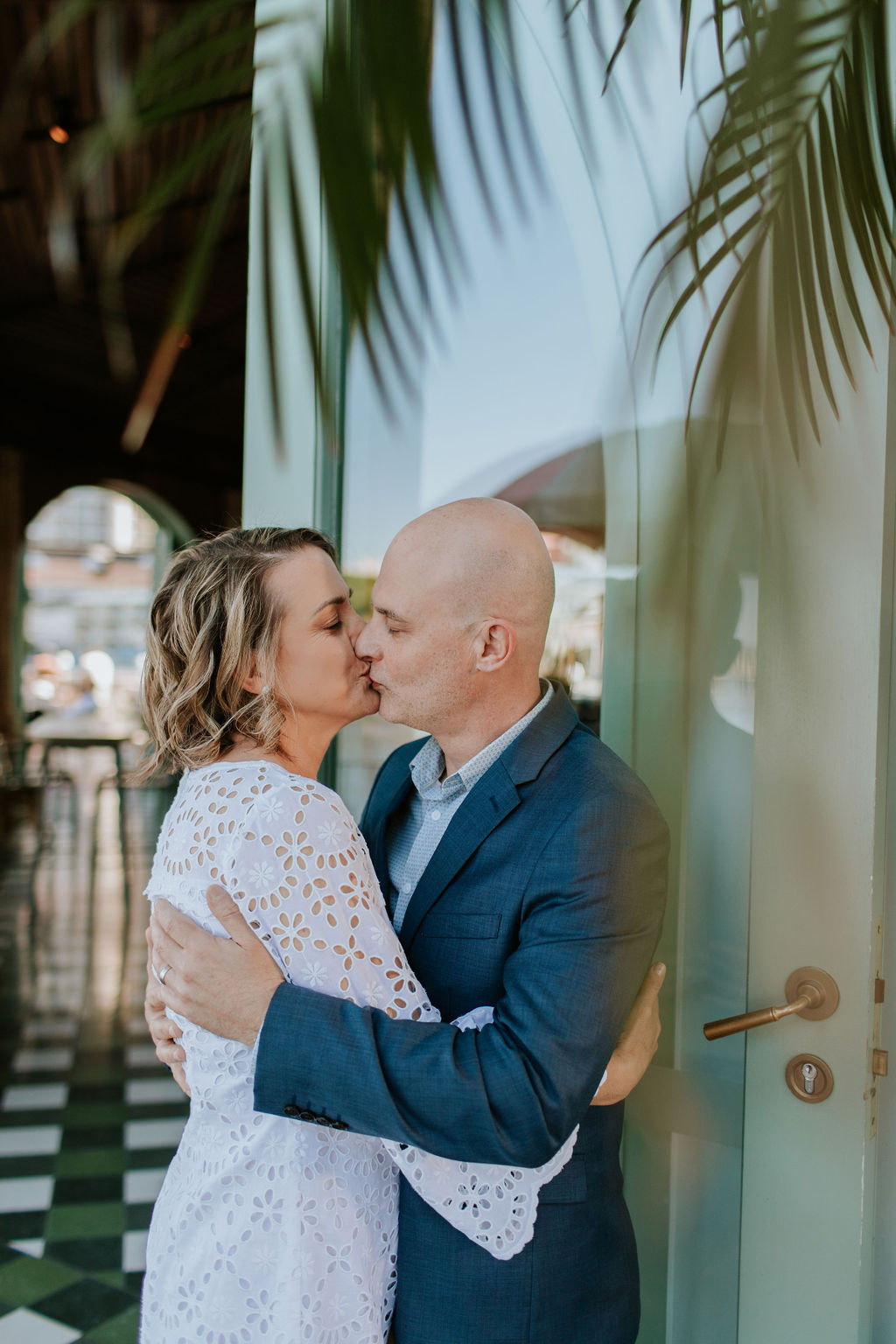 Newlyweds celebrating their Brisbane elopement with drinks at Mr Percival’s under the Story Bridge
